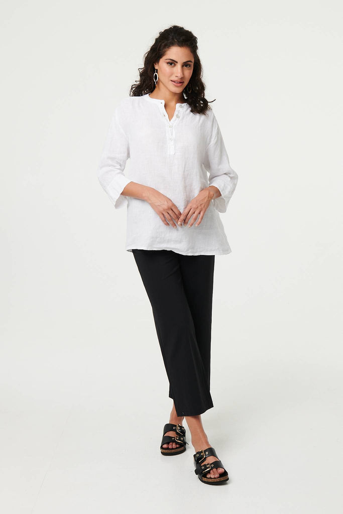Relaxed 3/4 Sleeve Button Neck Blouse