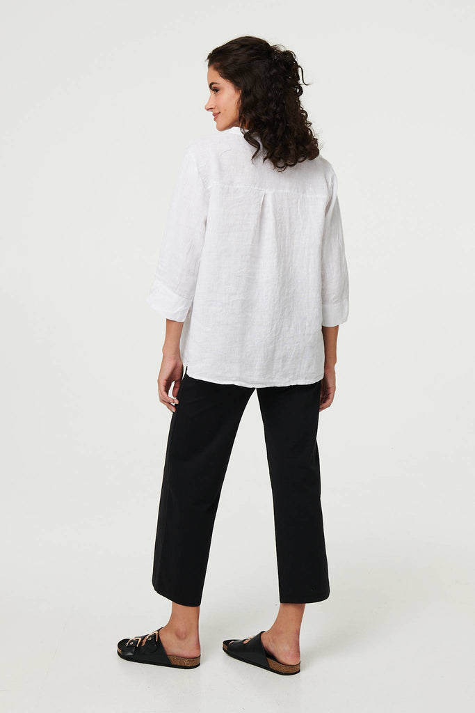 Relaxed 3/4 Sleeve Button Neck Blouse
